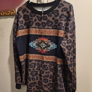 Crazy Train Leopard Print Sweater with Colorful Geometric Design